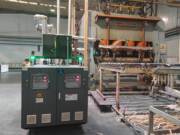 雙機一體模壓模溫機應用于貼面壓制，助力地板強化復合工藝